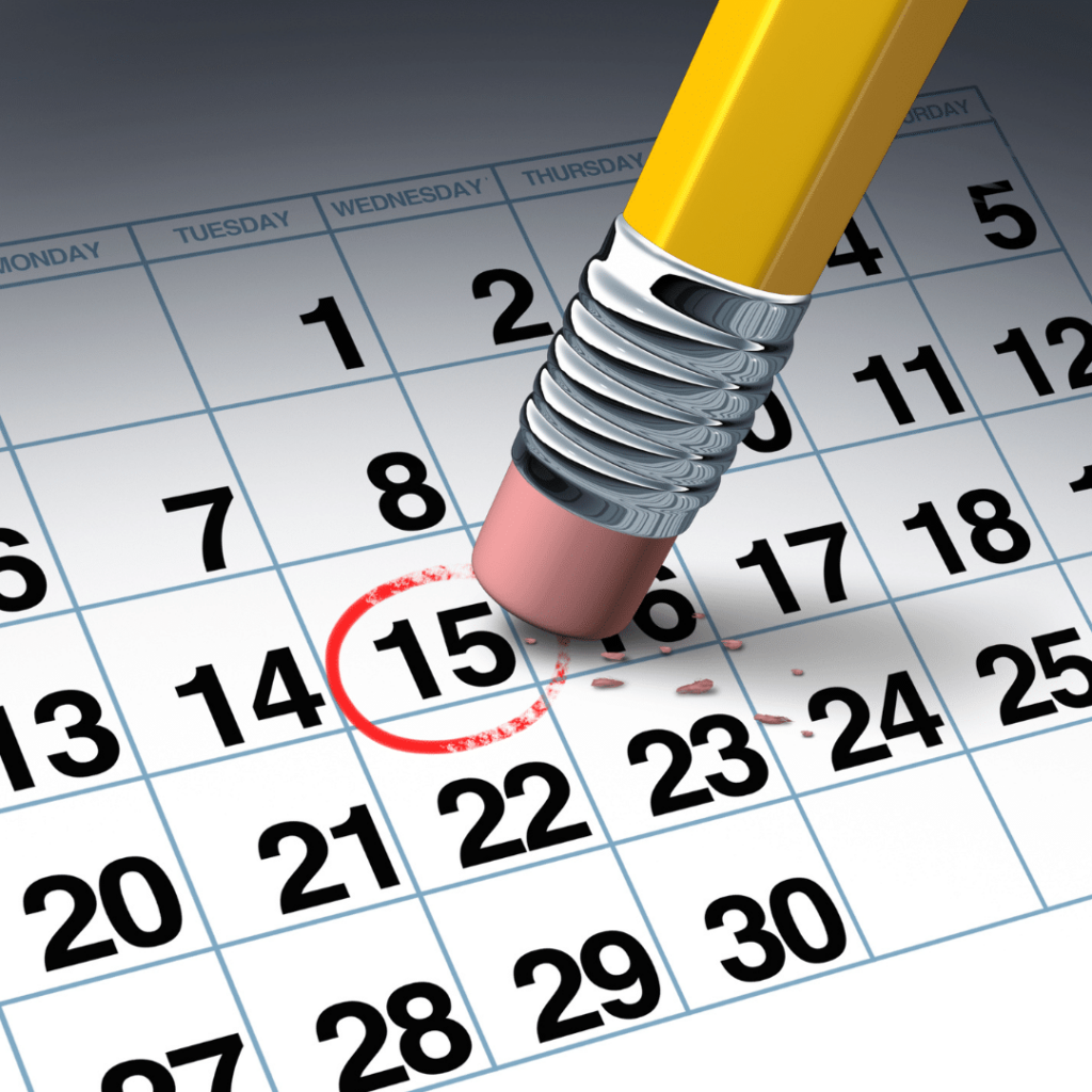 Une gomme de crayon effaçant une date entourée en rouge sur un calendrier